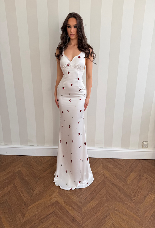 A floor-length dress crafted from delicate silk fabric